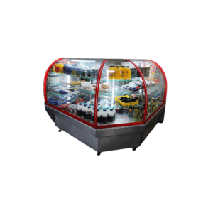 Material: • Estructura en acero inoxidable • Vidrio curvo de alta resistencia • Perfilería en aluminio/acero con acabado pintado Especificaciones Técnicas: • Diseño en forma de “L” con frente curvo panorámico • Sistema de refrigeración interna (según requerimiento) • Iluminación LED interior para mejor exhibición • Niveles internos con bandejas o parrillas ajustables • Vidrio templado curvo que mejora la visibilidad del producto • Base reforzada con estructura metálica • Puertas posteriores corredizas o abatibles para acceso • Control de temperatura (según configuración) Componentes: • Compresor hermético • Condensador (enfriado por aire) • Evaporador interno • Ventiladores de circulación • Controlador digital de temperatura Refrigerante: • Gas ecológico (R134a / R404A, según requerimiento) Especificaciones Técnicas: • Sistema de refrigeración forzada para distribución uniforme del frío • Temperatura de trabajo aproximada: 2°C a 8°C • Bajo nivel de ruido • Alta eficiencia energética • Protección térmica del compresor • Fácil mantenimiento y acceso Función: • Exhibición y conservación de productos refrigerados Aplicaciones: • Panaderías • Pastelerías • Minimarkets • Restaurantes • Tiendas de alimentos y bebidas Dimensiones: • Fabricación según diseño y requerimiento del cliente